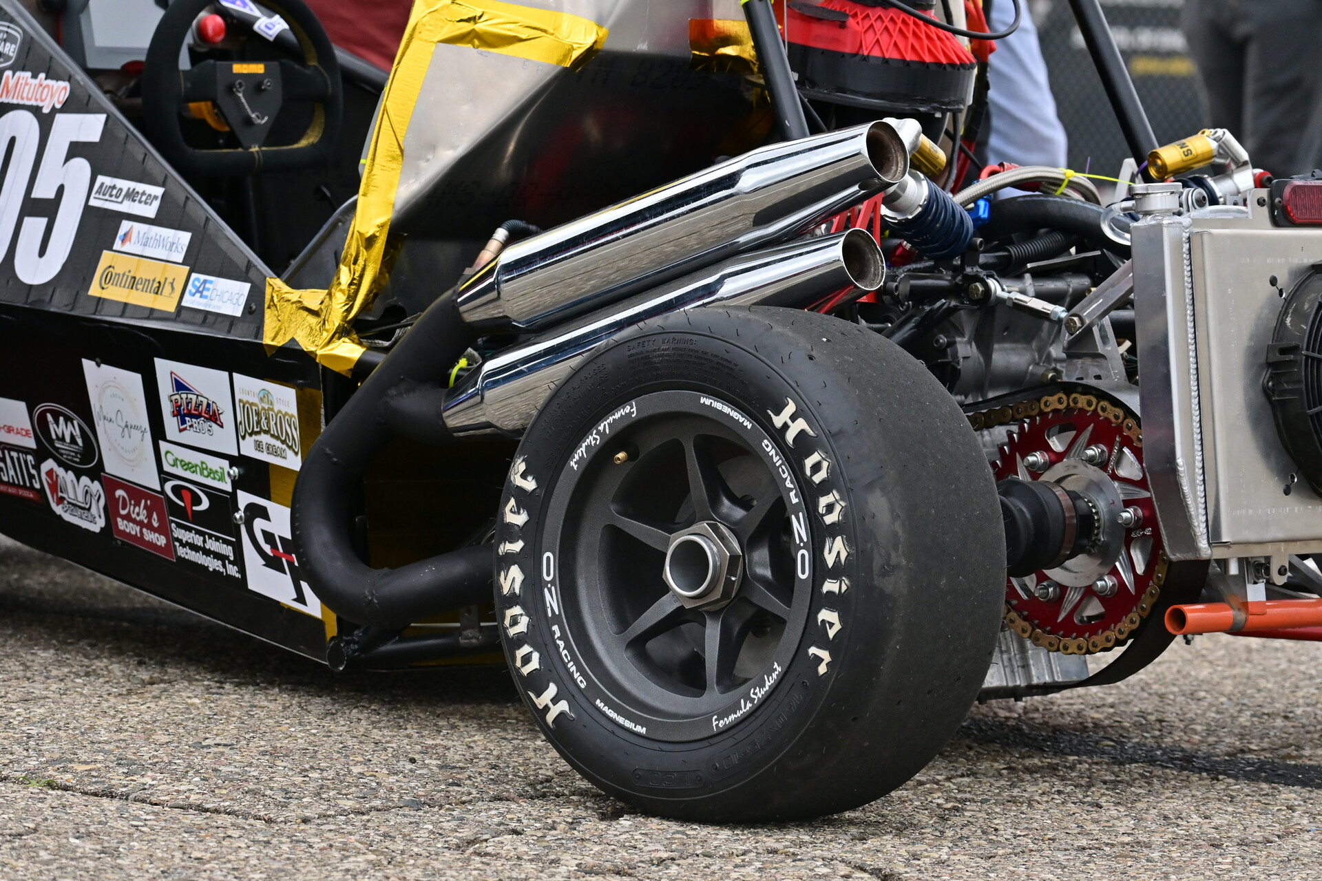 Team members building and assembling the race car