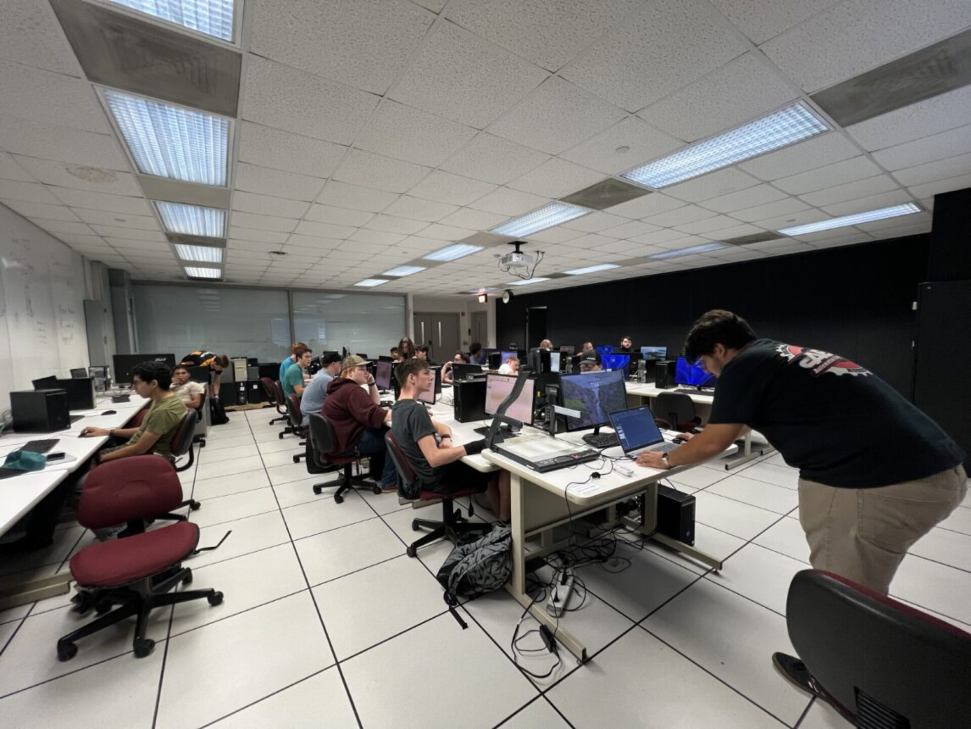 Livio Letteriello instructing a classroom of team members on the mechanics of SolidWorks.