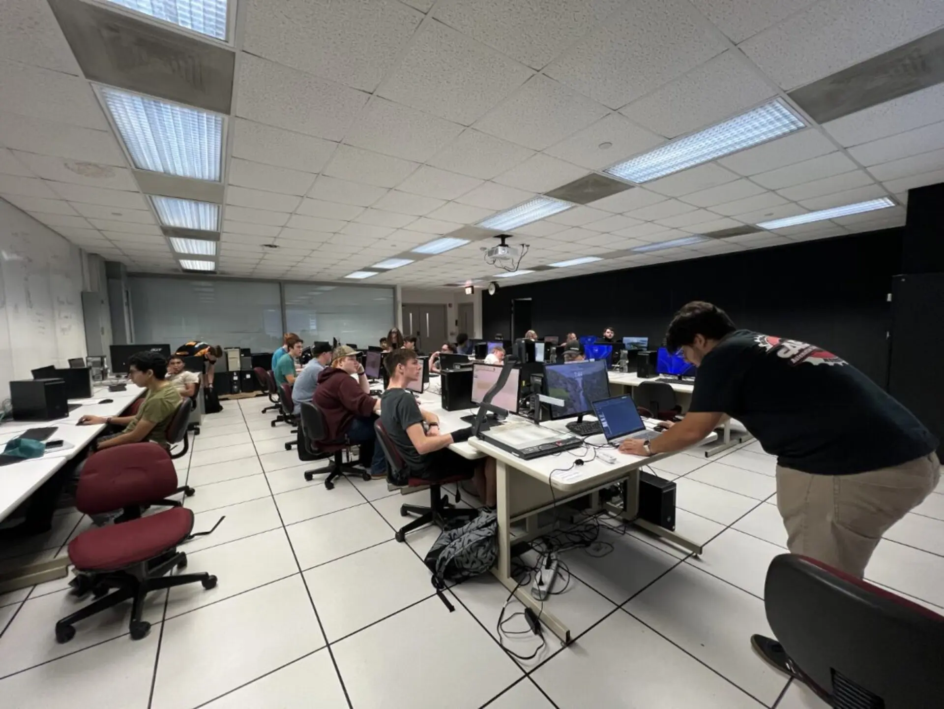 Livio Letteriello instructing a classroom of team members on the mechanics of SolidWorks.